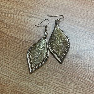 Gold feather shaped earrings